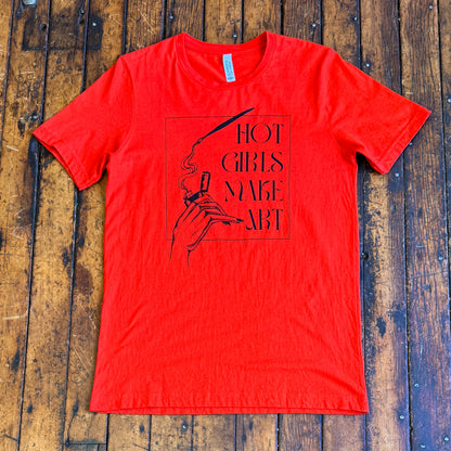 red tee shirt that says hot girls make art on the front with a hand holding a zippo lighter and smoke paint coming out of a paintbrush